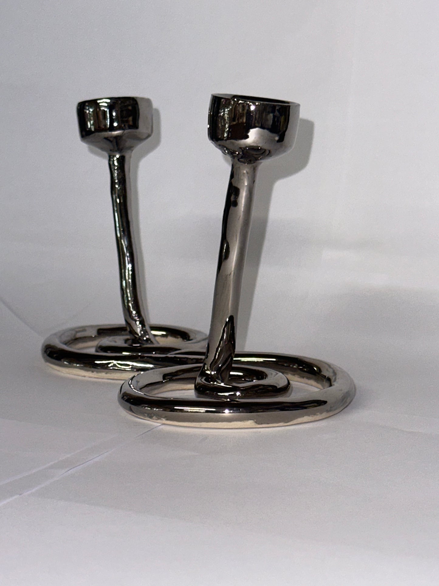 Double swirl candlestick holder