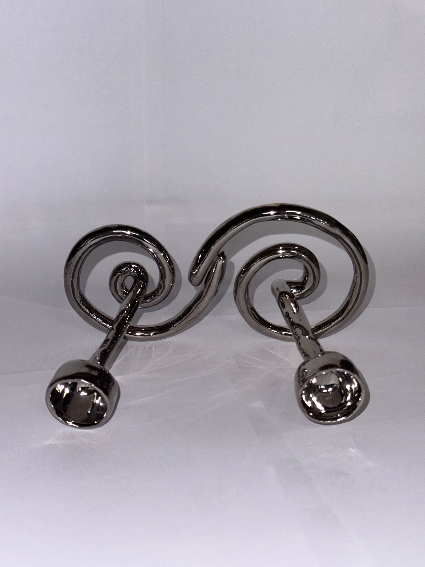 Double swirl candlestick holder